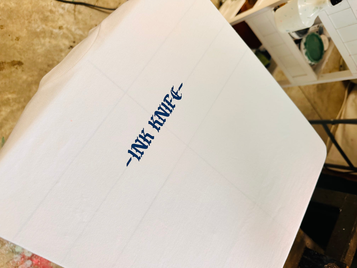 Samoa blue ink on white tee