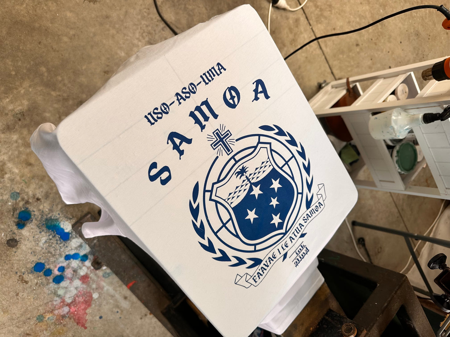 Samoa blue ink on white tee